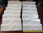 Lot Of 14 Truaire 115SW 15" Baseboard Diffusers, Sunburst Pattern White Steel. Fixed Price $100.00.
