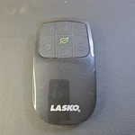 Lasko 7 Button Remote 5538-1# With Green Leaf Center Untested. Fixed Price $11.98.
