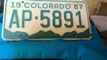 Colorado Vanity License 1967 Two Matching Plates "AP-5891". Fixed Price $40.00.